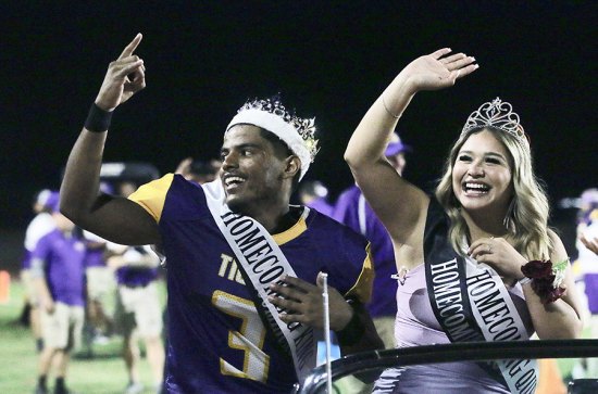 Lemoore High School celebrates Homecoming night with annual selection of King and Queen Homecoming King and Queen Kobe Green and Ella May Campos at halftime of the Lemoore football game.